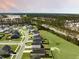 Aerial view of a home in a residential community with a spacious backyard and surrounding greenery at 269 Firewheel Ct, Summerville, SC 29486