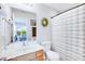 Bathroom with toilet, vanity, mirror and shower-tub combination at 282 Swallowtail Ln, Goose Creek, SC 29445