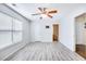 Bright, spacious bedroom with hardwood floors, a ceiling fan, and a closet at 282 Swallowtail Ln, Goose Creek, SC 29445