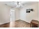 This is a simple bedroom with hardwood floors, closet and ceiling fan at 282 Swallowtail Ln, Goose Creek, SC 29445
