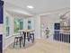 Bright breakfast nook featuring a bay window with backyard views adjacent to the living room at 303 High Grove Rd, Summerville, SC 29485