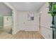 Open foyer with light-colored hardwood floors and neutral wall paint, leading to multiple rooms at 303 High Grove Rd, Summerville, SC 29485
