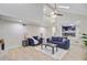 Open-concept living area with contemporary furnishings and a view of the kitchen at 303 High Grove Rd, Summerville, SC 29485