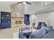 Comfortable living room with a brick fireplace, vaulted ceiling, and stylish furnishings at 303 High Grove Rd, Summerville, SC 29485