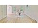 Open home office with hardwood floors and neutral wall color, providing a clean and functional workspace at 303 High Grove Rd, Summerville, SC 29485