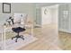 Bright home office featuring french doors, hardwood flooring, and ample workspace at 303 High Grove Rd, Summerville, SC 29485