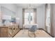 Bright office space featuring shiplap walls, modern lighting, and neutral decor at 304 Archar St, Summerville, SC 29486