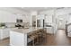 Bright kitchen featuring a large island with seating, stainless steel appliances, and modern finishes, ideal for Gathering gatherings at 306 Archar St, Summerville, SC 29486