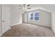 Spacious bedroom with carpet, a ceiling fan, and natural light at 316 Beachgrass Ln, Summerville, SC 29486
