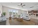 Comfortable living room with large sectional sofa and views into the kitchen at 316 Beachgrass Ln, Summerville, SC 29486