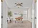 Bright home office featuring neutral walls, carpet floors, modern ceiling fan, and plenty of natural light at 316 Beachgrass Ln, Summerville, SC 29486