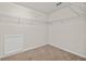 Walk-in closet features wire shelving and carpeted floor at 316 Beachgrass Ln, Summerville, SC 29486