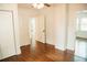 Bright bedroom with hardwood floors and white walls at 317 Bay St, Walterboro, SC 29488