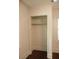 Empty closet with rod for hanging clothing at 317 Bay St, Walterboro, SC 29488