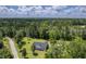 Aerial shot of a lovely home with a spacious lot surrounded by green trees at 326 Turner Ln, Round O, SC 29474