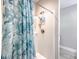 Bathroom shower with blue patterned shower curtain at 326 Turner Ln, Round O, SC 29474