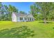 Well-maintained single-story home with a tidy front lawn and inviting entrance at 326 Turner Ln, Round O, SC 29474
