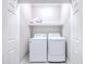 Bright laundry room featuring a white washer and dryer at 326 Turner Ln, Round O, SC 29474