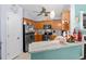 Well-lit kitchen with modern stainless steel appliances, granite countertops, and decorative backsplash at 3312 Telford Ct, Summerville, SC 29485