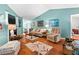 Inviting living room with a fireplace, hardwood floors, and neutral decor at 3312 Telford Ct, Summerville, SC 29485