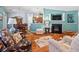 Comfortable living room showcases an open layout, fireplace, and seamless flow to dining area at 3312 Telford Ct, Summerville, SC 29485