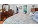 Main bedroom with a dresser, access to a walk-in closet and an ensuite bathroom at 3312 Telford Ct, Summerville, SC 29485