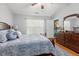 Comfortable main bedroom bathed in natural light features a dresser and ensuite bathroom at 3312 Telford Ct, Summerville, SC 29485