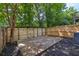 Private backyard with a wooden deck and lush greenery at 4028 Babbitt St, Charleston, SC 29414