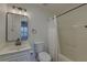 This bathroom features modern lighting and a full tub with shower at 4028 Babbitt St, Charleston, SC 29414