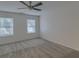 This is a bedroom with neutral-toned walls, carpet, and a contemporary ceiling fan at 4028 Babbitt St, Charleston, SC 29414