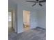 Bedroom showing ensuite bath and access to another bedroom at 4028 Babbitt St, Charleston, SC 29414