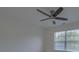 This bedroom features a ceiling fan and window to provide lots of light at 4028 Babbitt St, Charleston, SC 29414