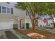 Attractive townhome exterior with well-maintained landscaping and attached garage at 4028 Babbitt St, Charleston, SC 29414