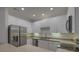 Well-lit kitchen featuring stainless steel appliances and plenty of cabinet space at 4028 Babbitt St, Charleston, SC 29414