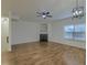 Spacious living room features hardwood floors, fireplace, and natural light at 4028 Babbitt St, Charleston, SC 29414