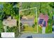 Aerial view of a home showing the property lines, the roof and the surrounding yard at 405 Amberjack Way, Summerville, SC 29485