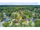 An aerial of the property with the house marked by a yellow pin and surrounded by trees at 405 Amberjack Way, Summerville, SC 29485