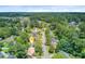 Overhead view of a residential area with mature trees and proximity to shopping and recreation highlighted at 405 Amberjack Way, Summerville, SC 29485