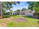 Expansive backyard featuring a concrete patio and verdant lawn at 405 Amberjack Way, Summerville, SC 29485
