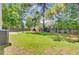 Overhead view of the expansive backyard with a well-maintained lawn and mature trees at 405 Amberjack Way, Summerville, SC 29485