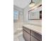 Bathroom with a vanity, neutral countertops, and decorative mirror at 405 Amberjack Way, Summerville, SC 29485
