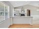 Bright kitchen with stainless steel appliances, modern hood, and ample counter space at 405 Amberjack Way, Summerville, SC 29485