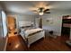 Bright bedroom featuring hardwood floors, a walk-in closet and an adjacent bathroom at 409 Azalea Dr, Walterboro, SC 29488