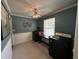 Laundry room featuring washer, dryer, and built-in desk with plenty of natural light at 409 Azalea Dr, Walterboro, SC 29488