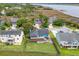 Aerial view of a home highlighting the large backyard, deck, and location in a serene, green neighborhood at 4636 Ashley View Ln, North Charleston, SC 29405