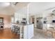 Well-lit kitchen with stainless steel appliances, bar seating, white cabinets, and an open design at 4636 Ashley View Ln, North Charleston, SC 29405