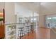 Stylish kitchen featuring a breakfast bar, stainless steel appliances, and an open layout at 4636 Ashley View Ln, North Charleston, SC 29405