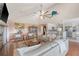 Spacious living room with hardwood floors, comfortable seating, and an open layout to the kitchen at 4636 Ashley View Ln, North Charleston, SC 29405