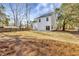 Large backyard enclosed by wooden fencing perfect for outdoor activities and privacy at 518 Fleming Rd, Charleston, SC 29412