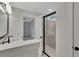 Modern bathroom with a marble shower, black fixtures, and a stylish mirror at 518 Fleming Rd, Charleston, SC 29412